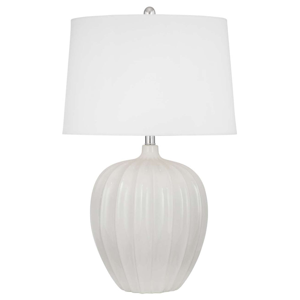 Modern white ribbed ceramic table lamp with a white drum shade for contemporary home decor.