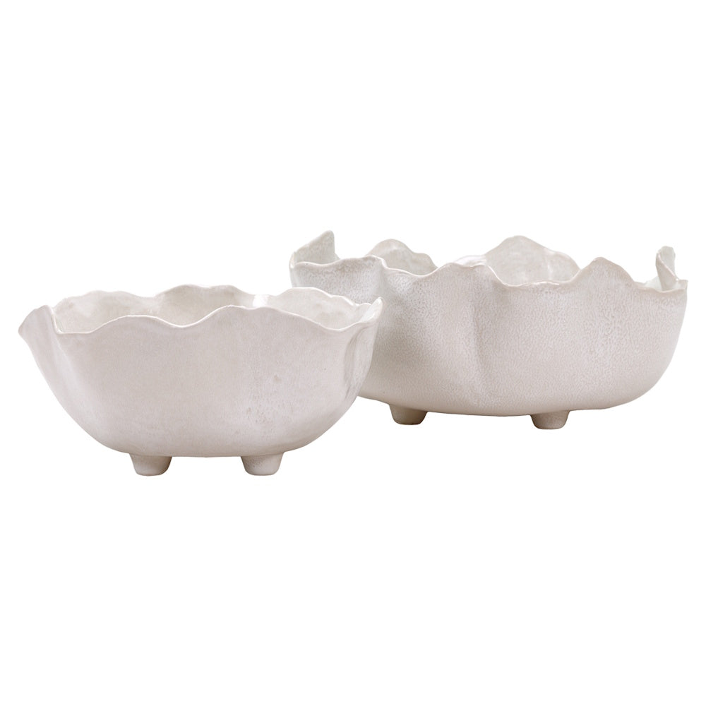 Set of two Magnus white decorative ceramic bowls with wavy scalloped edges and tripod feet on a white background.