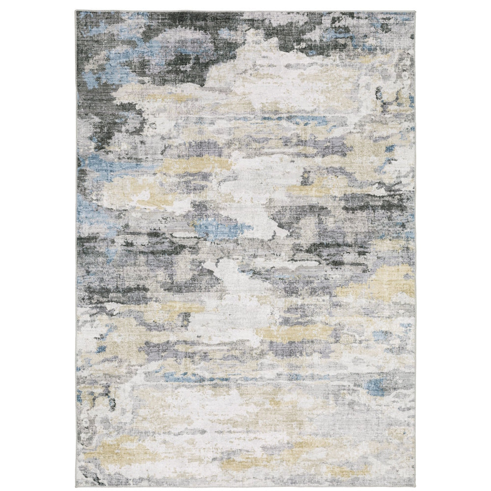 Abstract area rug with a distressed texture in shades of grey, blue, cream, and muted yellow.