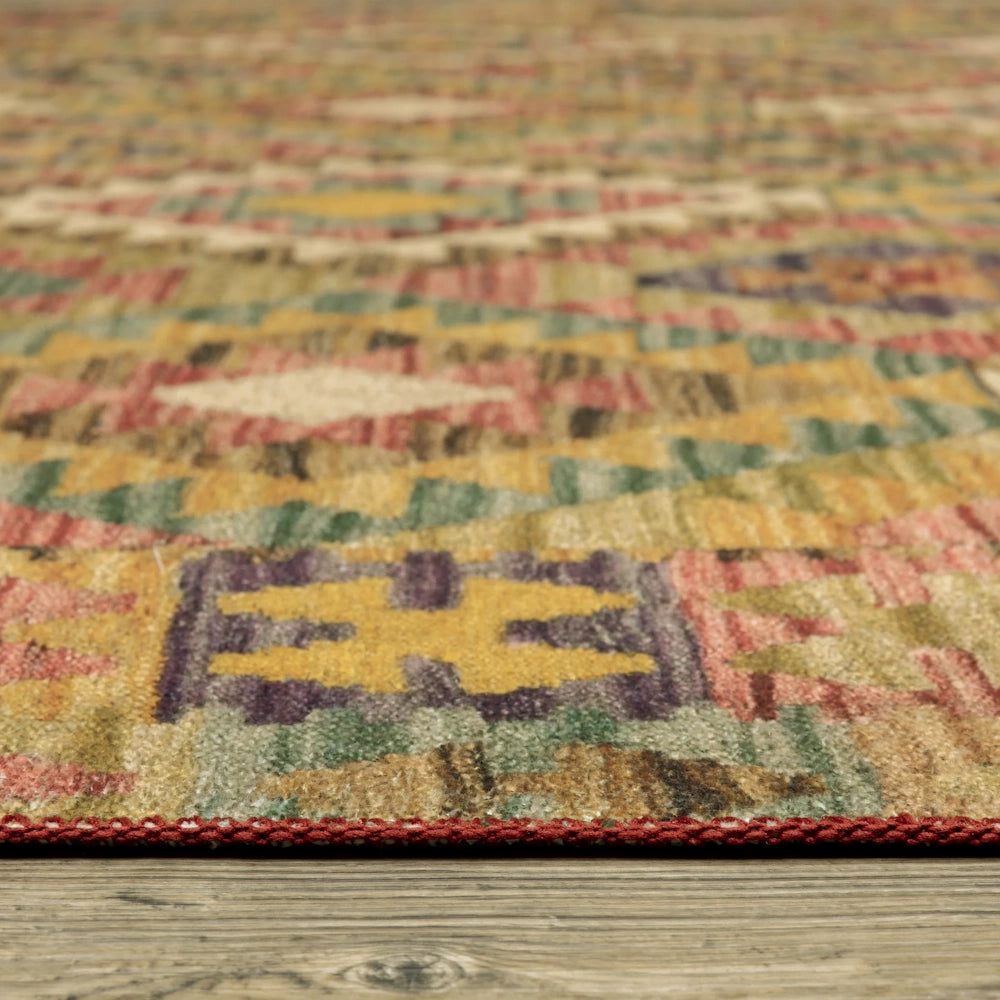 Close-up low angle view of a geometric diamond-patterned rug, showing texture and edge stitching.