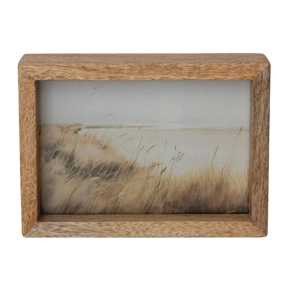 Mango wood floating photo frame with double-sided glass displaying a landscape of coastal beach grass and dunes.