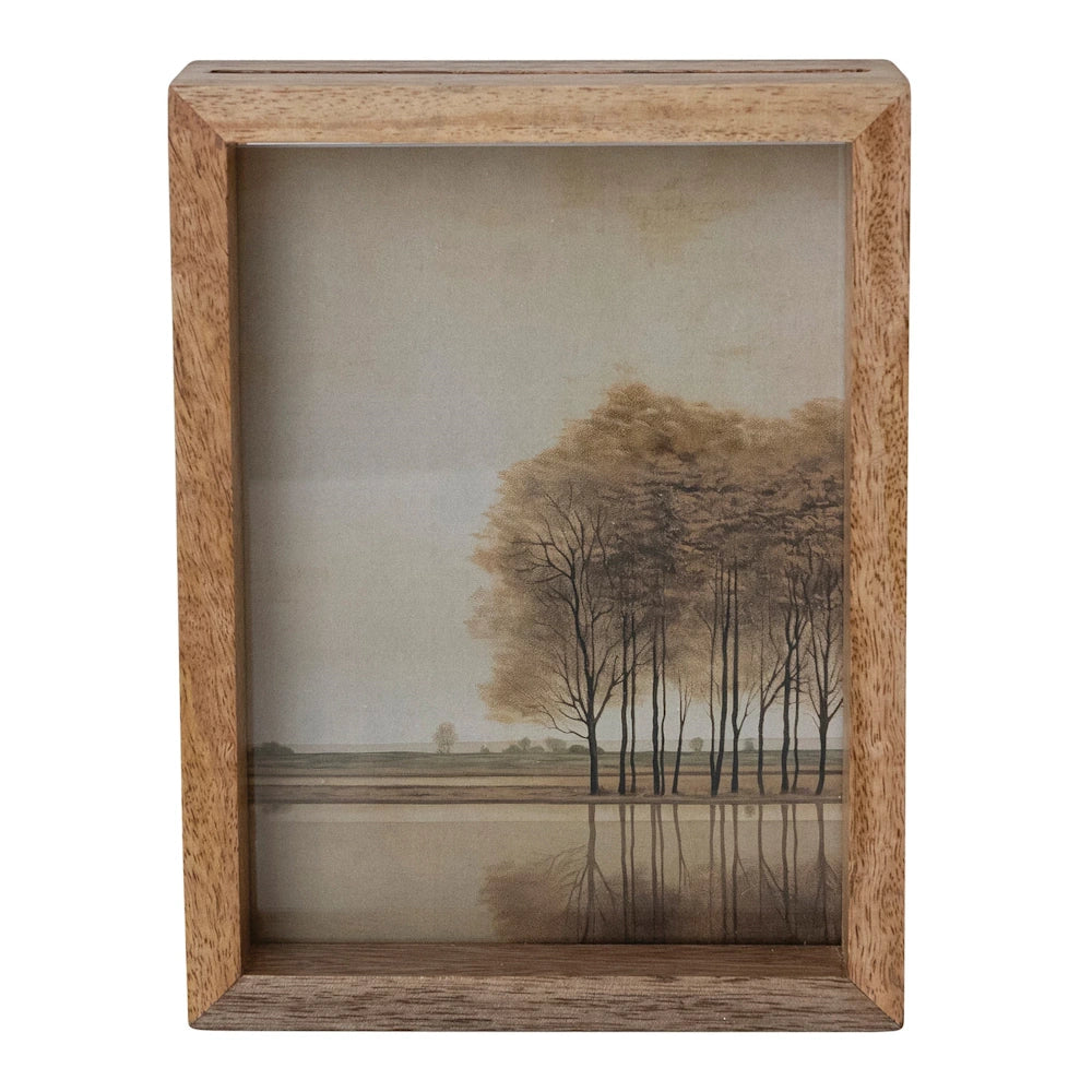 Mango wood floating photo frame featuring a glass-enclosed landscape painting of trees reflecting on a calm lake.