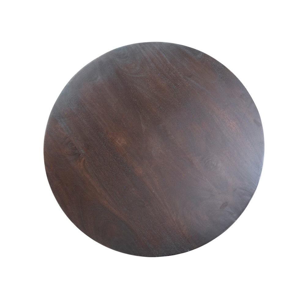 Top view of a round dark mango wood table top on a white background.