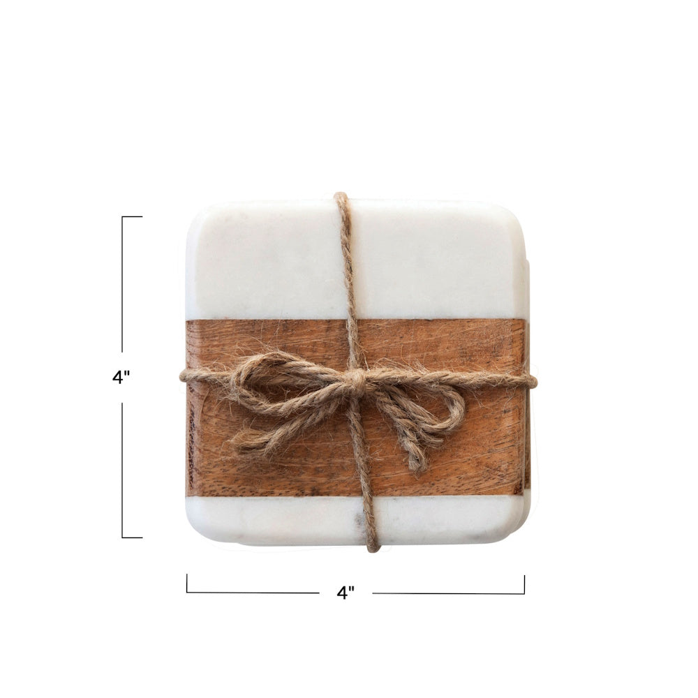Stack of 4x4 inch square coasters made of white marble and brown wood, tied together with twine.