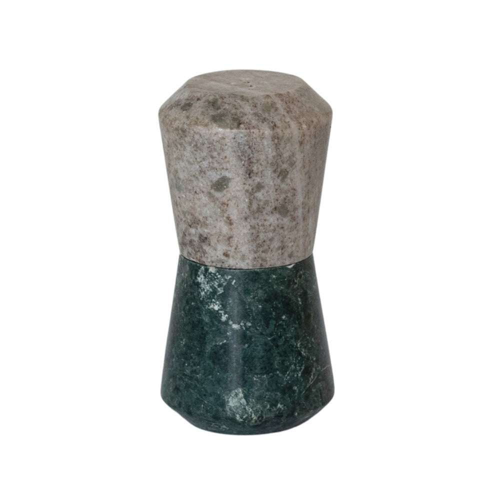 Stacked marble salt and pepper shakers; top is beige-grey speckled stone, bottom is dark green marble.