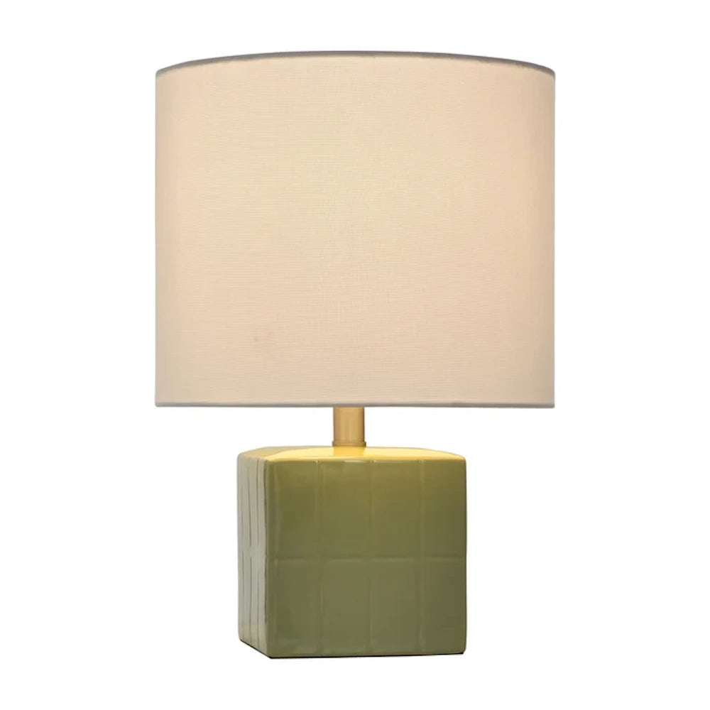 Matilda mint green ceramic accent lamp with a textured square base and a white drum shade. Designed by Tamara Day.
