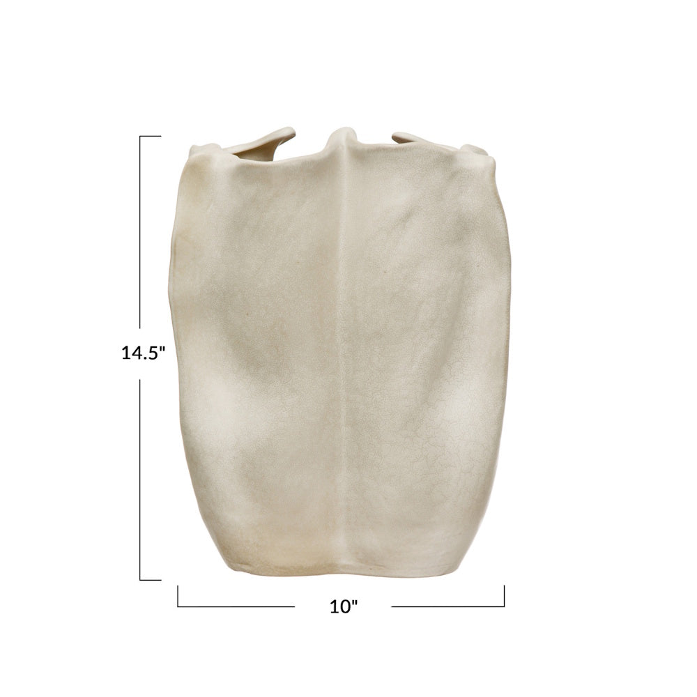 A matte cream stoneware organic-shaped vase with dimensions showing a 14.5" height and a 10" width.