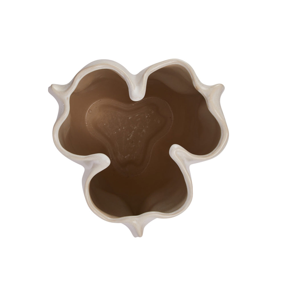 Top-down view of an empty cream-colored stoneware vase with a unique, three-lobed organic shape.