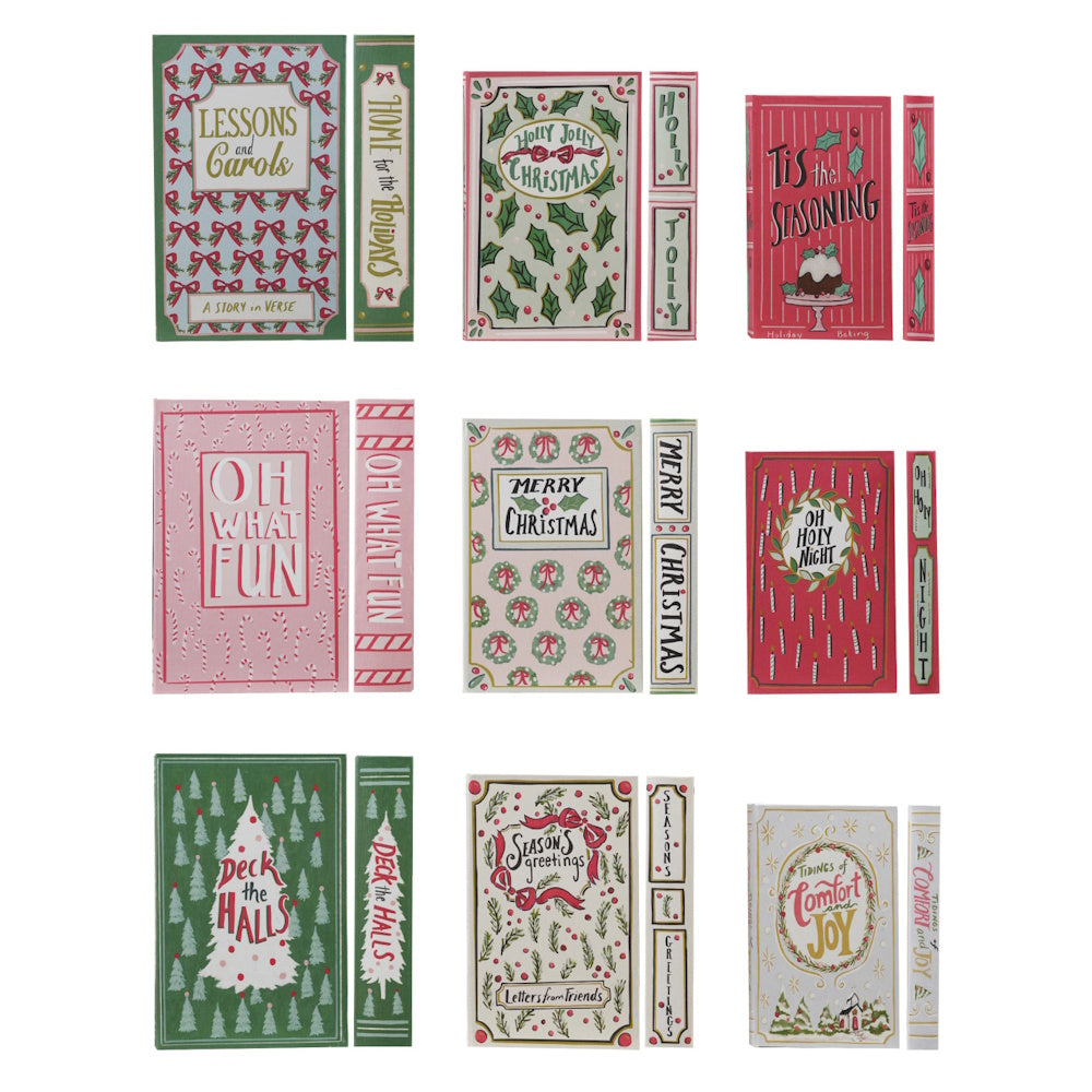Set of nine festive Christmas book-shaped decorative boxes featuring holiday patterns and titles.