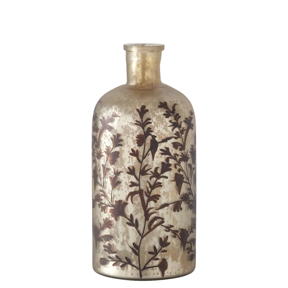 Champagne mercury glass bottle vase featuring an intricate dark brown floral and branch pattern.