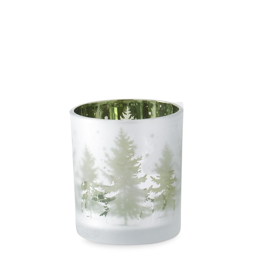 Medium frosted glass candle holder with green metallic interior, depicting pine trees and deer in a winter scene.