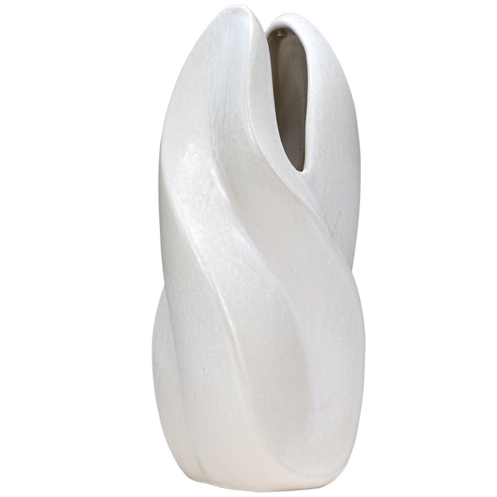 Modern tall white ceramic vase with a sculpted twist design and smooth matte finish, ideal for minimalist home decor.