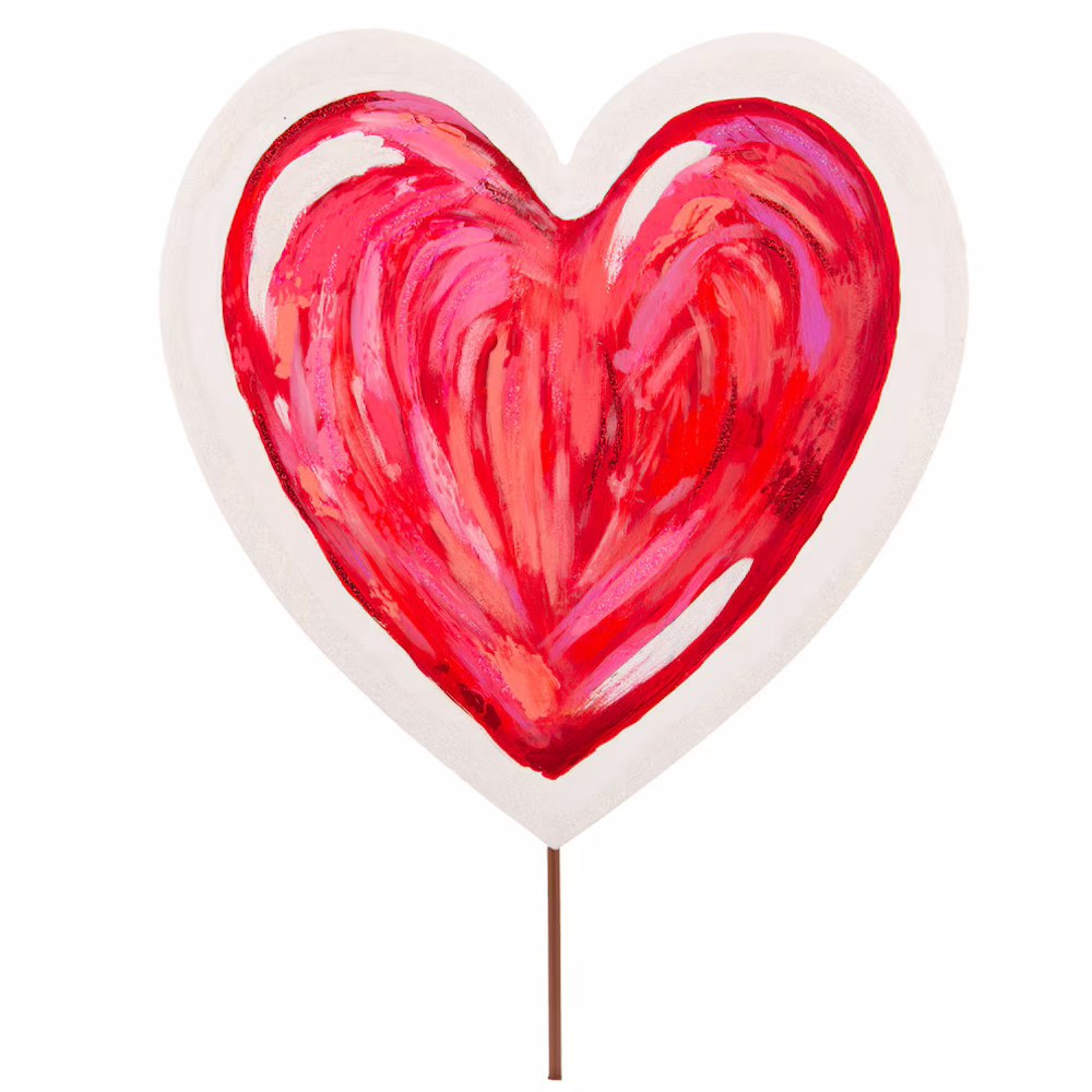 Hand-painted red heart with messy brushstrokes and pink accents on a white heart-shaped sign with a brown stick.