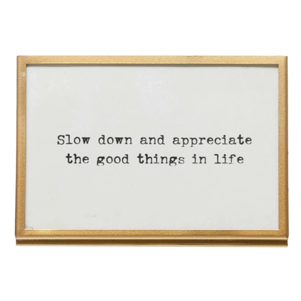 Gold metal and glass picture frame with inspirational quote "Slow down and appreciate the good things in life."