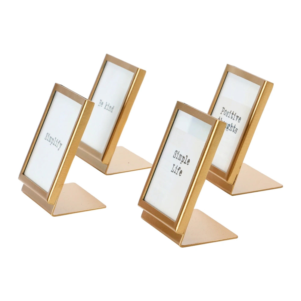 Set of 4 gold metal and glass picture frames with easel stands and motivational quotes including "Simple Life" and "Be Kind."