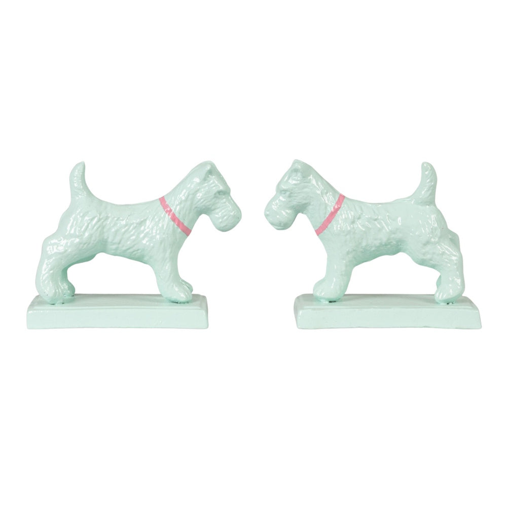 Two light green, cast iron Scottish Terrier bookends facing each other, wearing small pink collars.