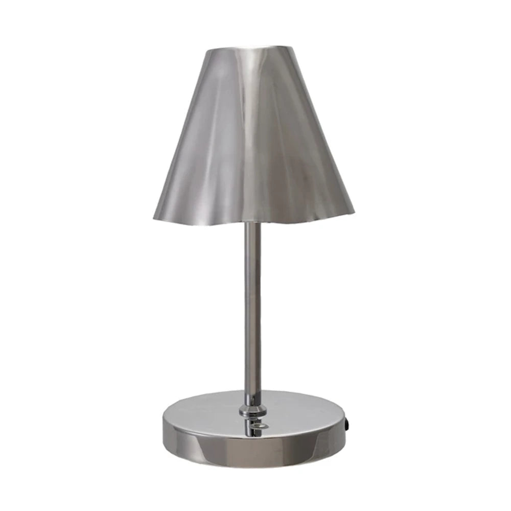 Silver metal LED table lamp with a ruffled shade and touch sensor.