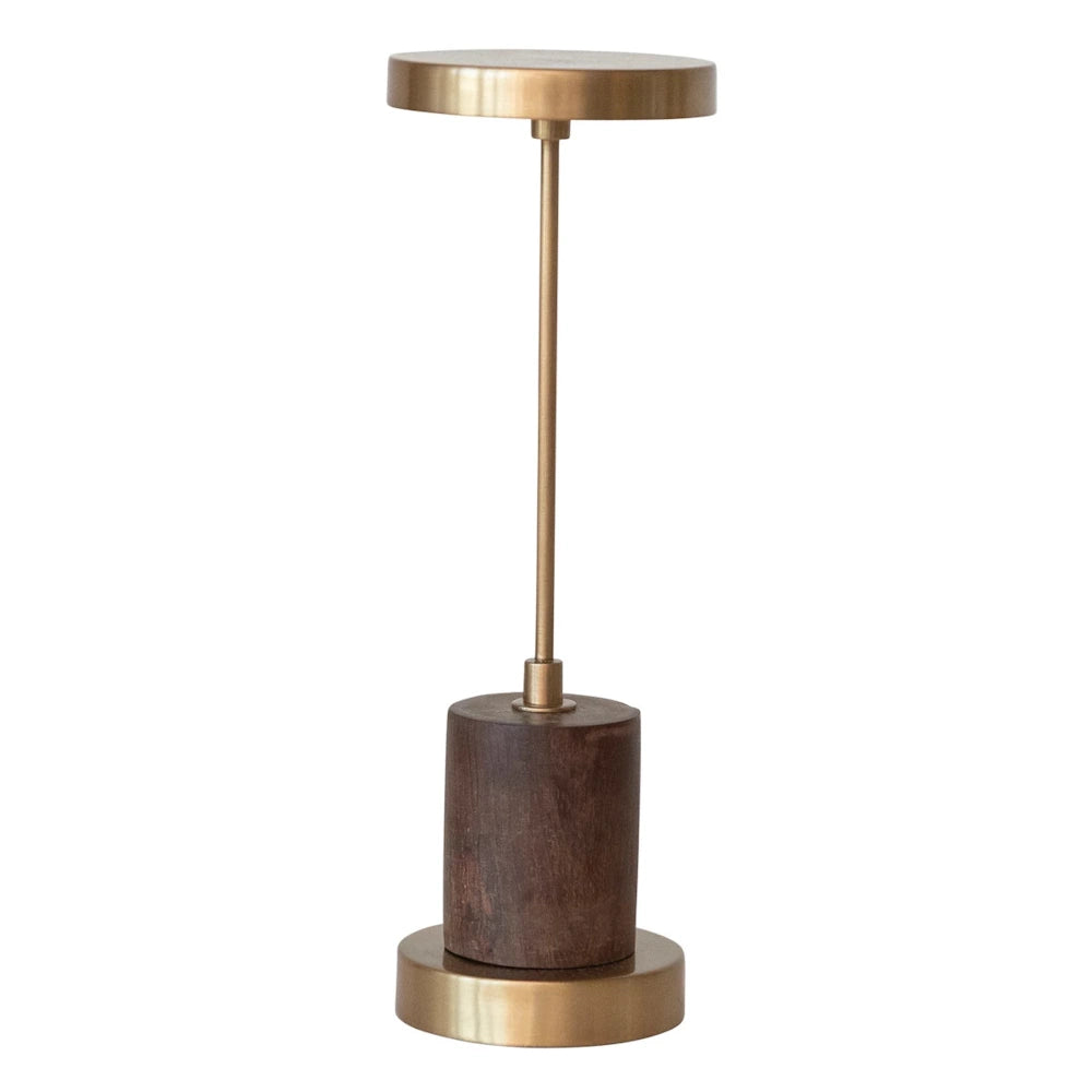 Modern cordless LED table lamp featuring a gold metal finish and a dark mango wood cylindrical base on a white background.