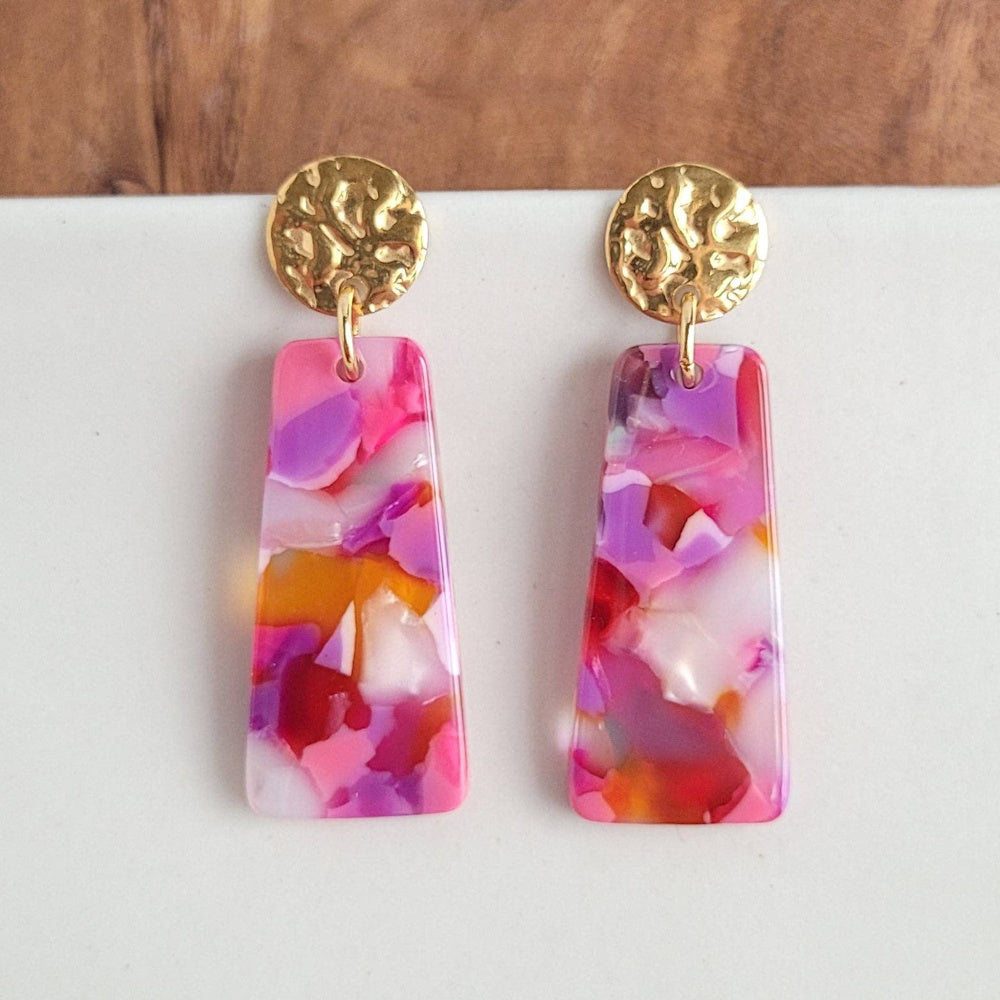 Hammered gold disk stud earrings with a dangling rectangular resin drop featuring a colorful multi-colored patchwork print.