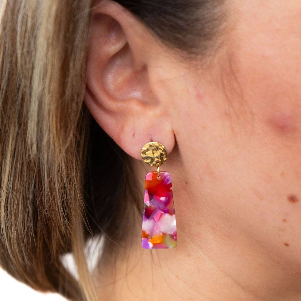 Model wearing Paradise Pink Mia Mini mosaic resin drop earrings with hammered gold studs.