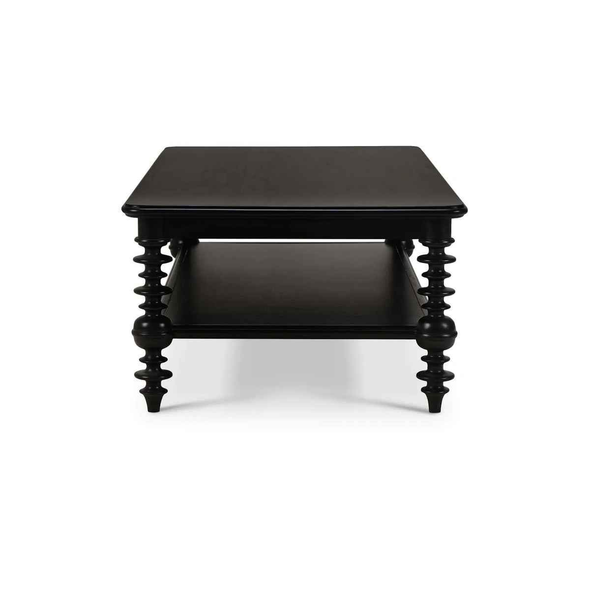 Side profile of a black wood coffee table featuring an open storage shelf and ornate turned spindle legs.