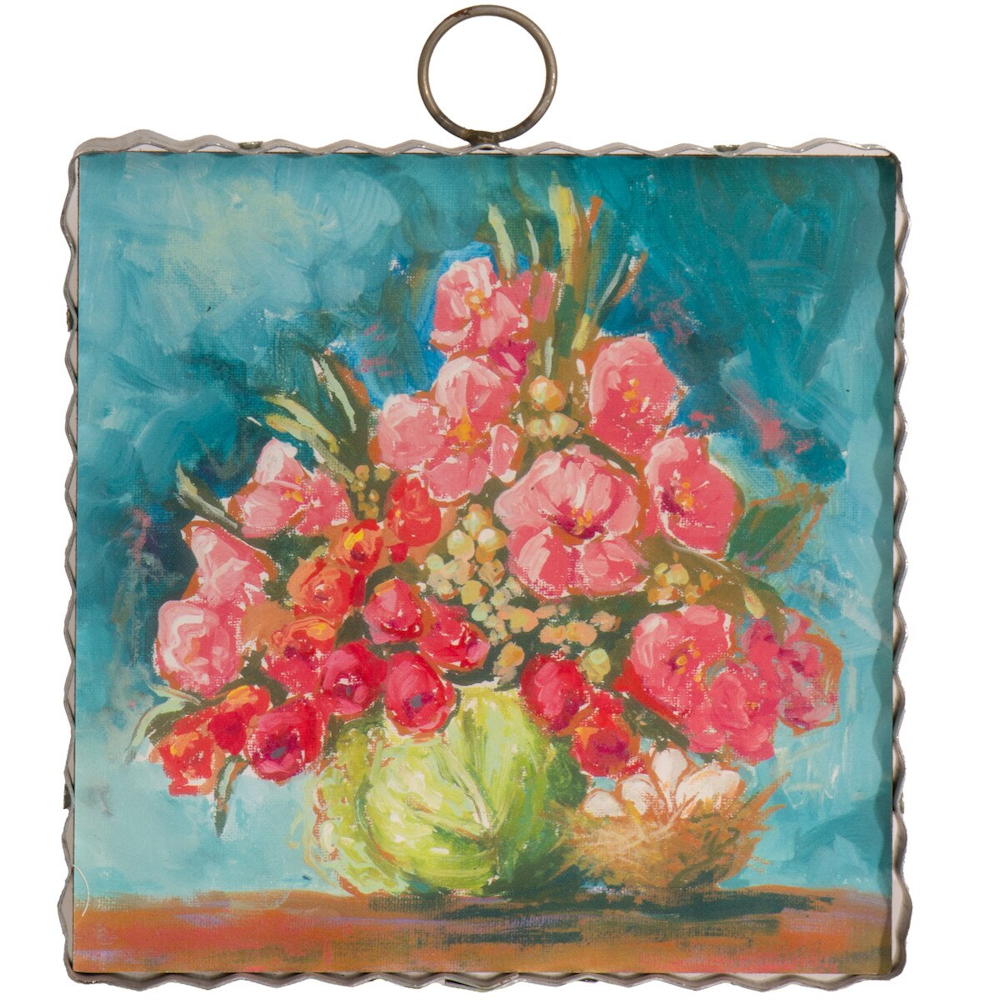 Impressionist painting of pink and red flowers in a cabbage vase on a teal background with a silver scalloped frame.