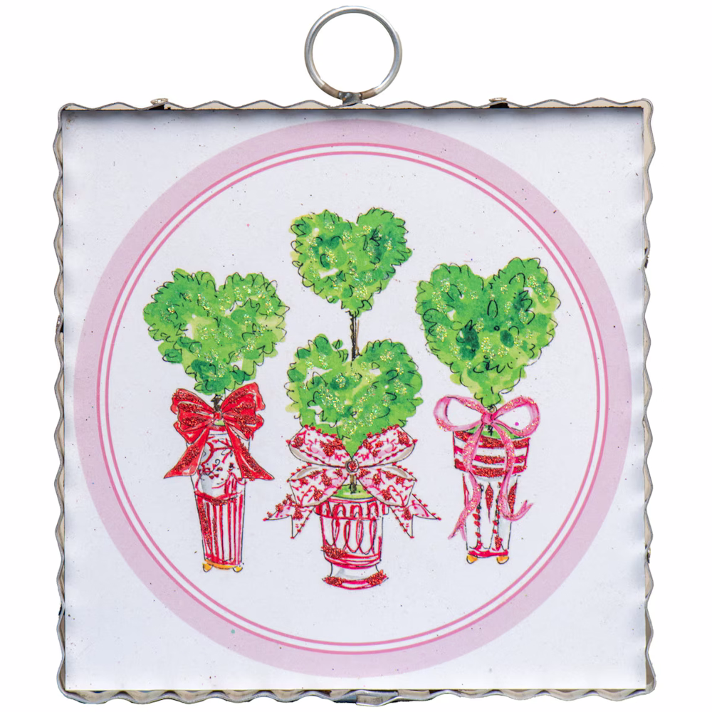 Illustration of heart-shaped topiary plants in red and pink decorative pots with ribbons on a white background.