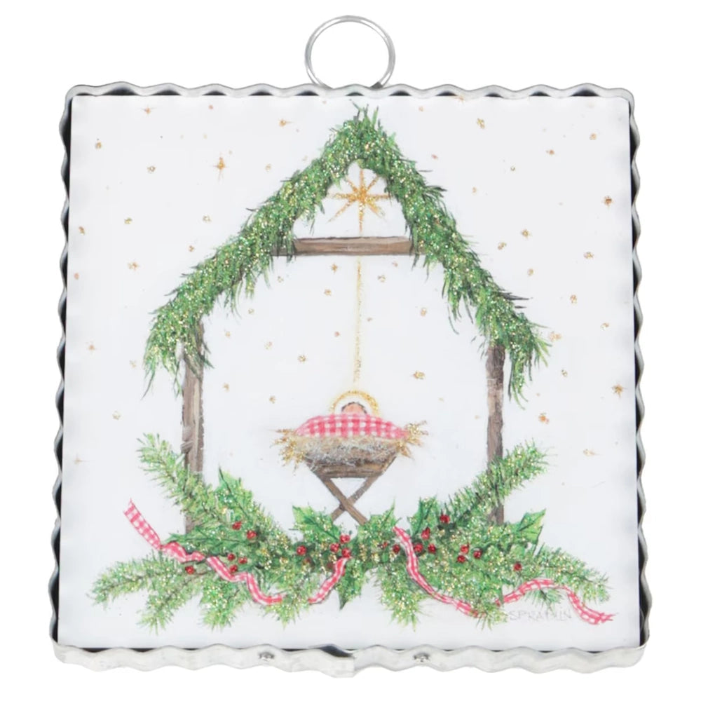 Front view of the white and green Gingham King art plaque featuring a painted wooden nativity design.