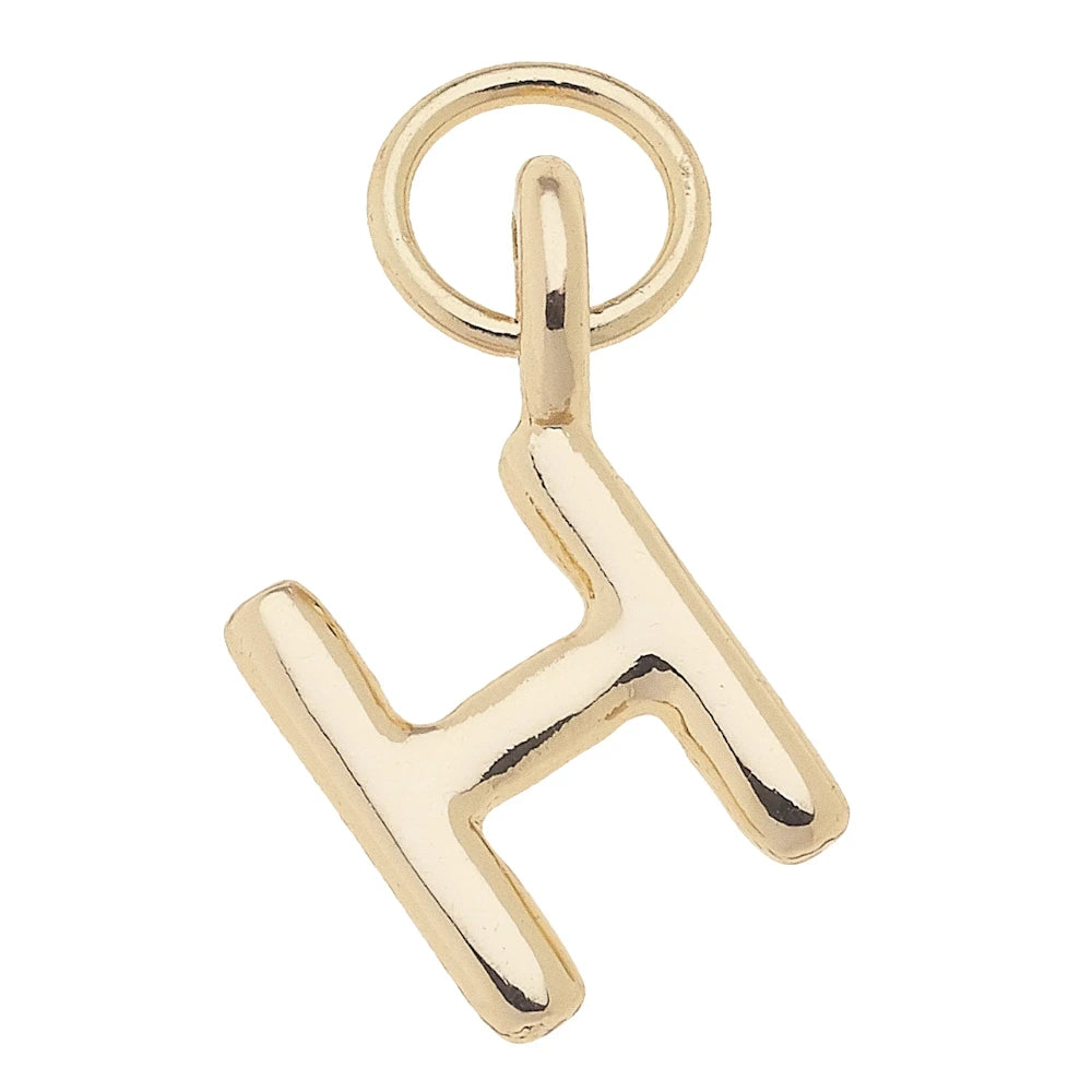 Shiny gold mini initial H charm with a polished finish and a circular jump ring for jewelry making.