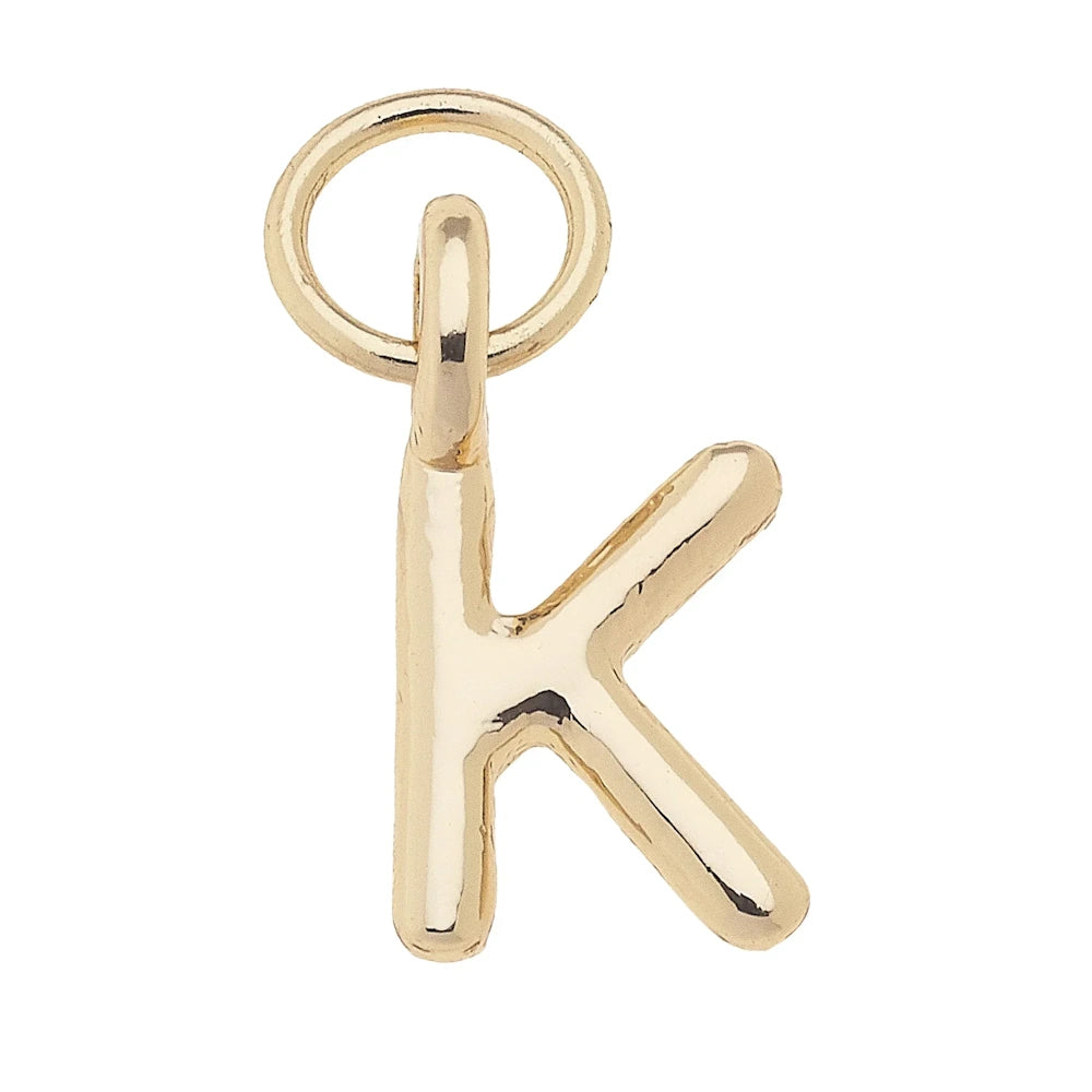 Shiny gold mini initial letter K charm pendant with a polished finish and circular jump ring for jewelry making.