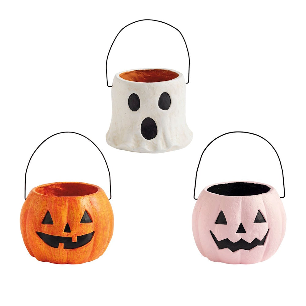 Mini papier-mache Halloween treat buckets including a white ghost, orange jack-o'-lantern, and pink pumpkin.
