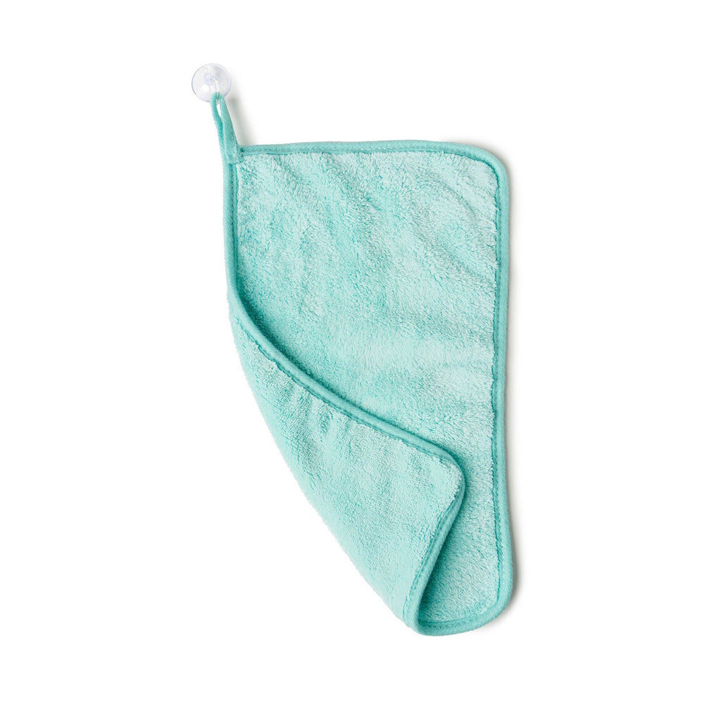 Mint green Water Works makeup removing towel made of soft fleece with a suction cup for hanging.
