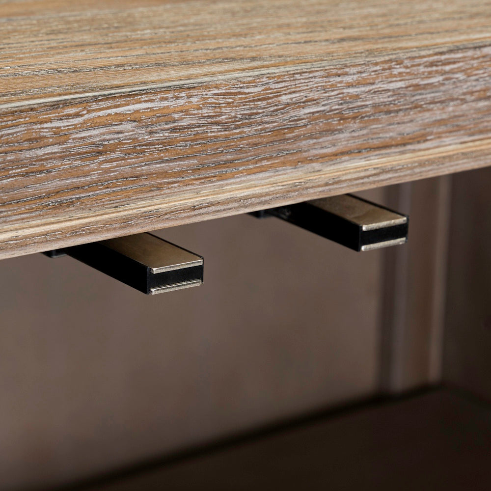 Close-up of the wooden cabinet frame showing push-to-open latch mechanisms.