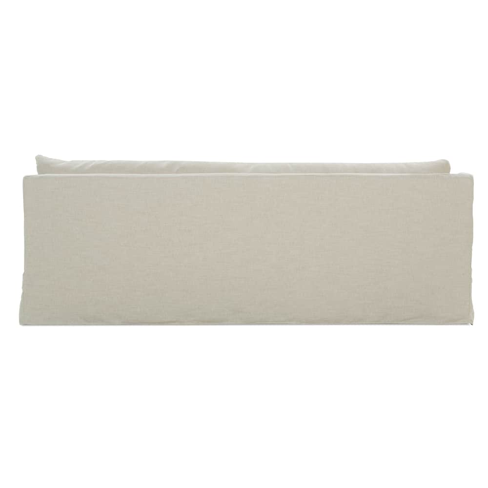 Rear view of a beige Moreau slipcovered sofa with a smooth, straight fabric backrest.