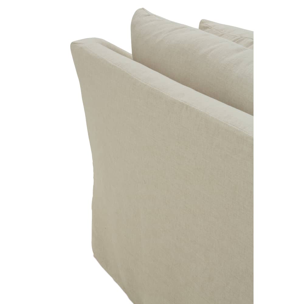 Close-up back view of the Moreau beige fabric slipcovered sofa with soft linen cushions on a white background.