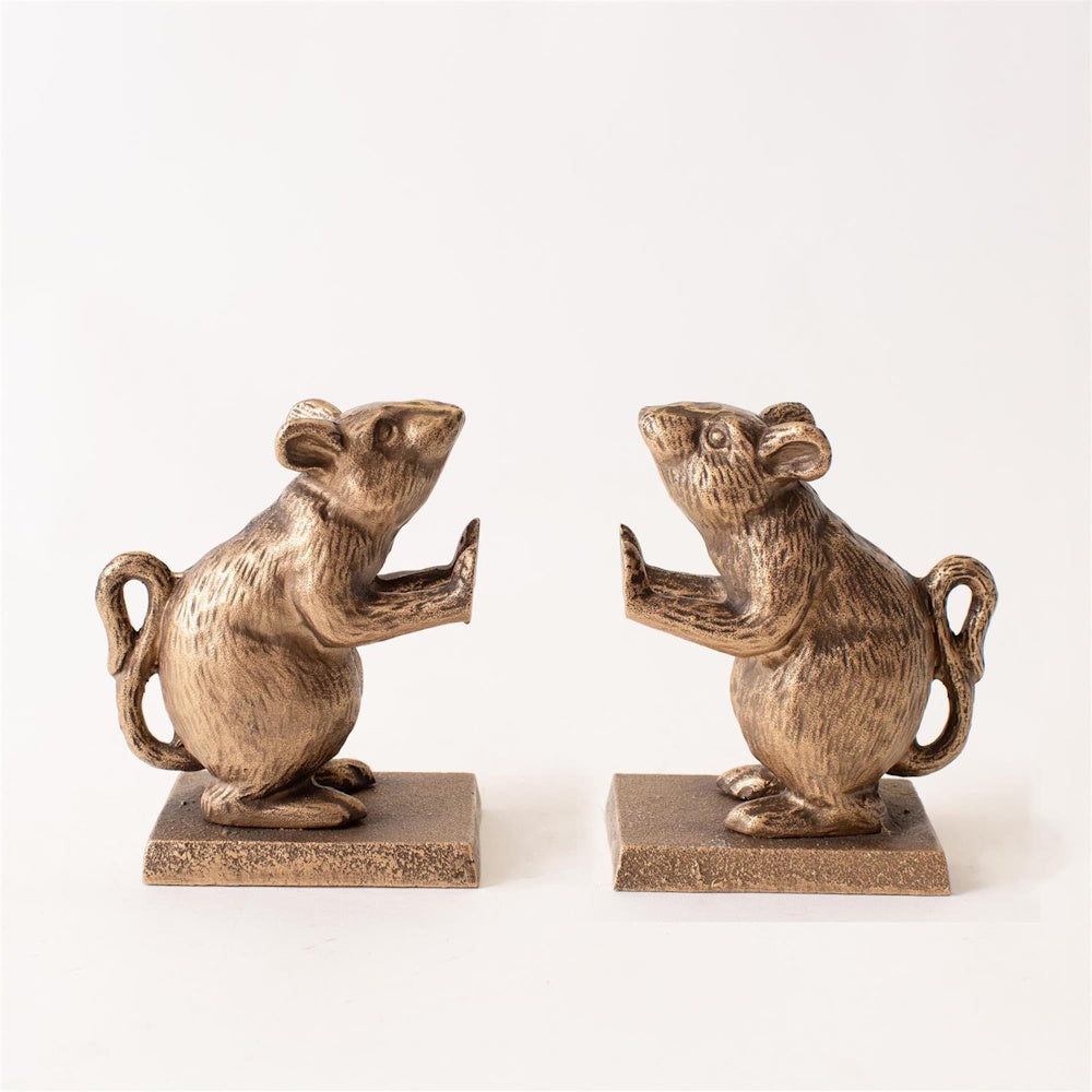 Bronze mouse bookends facing each other with hands raised, set on a white background.