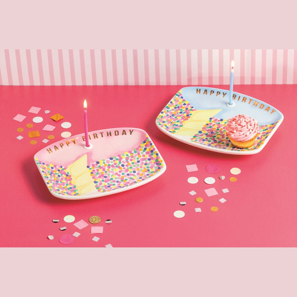 Two musical Happy Birthday ceramic plates with confetti patterns and built-in candle holders.