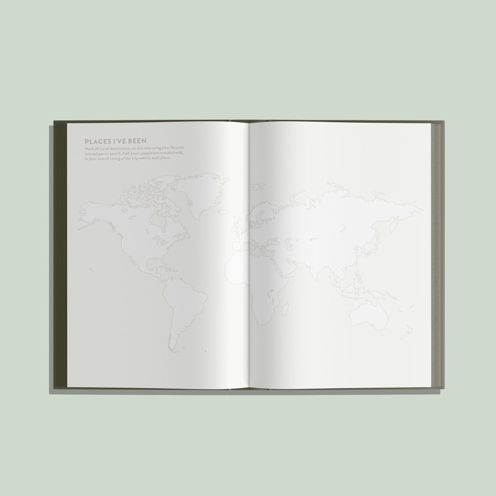 Open travel journal showing a world map spread with the heading "Places I've Been" on a light sage green background.