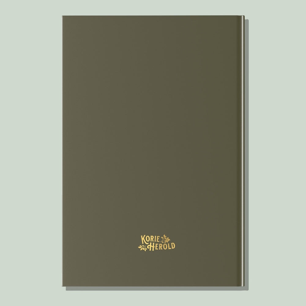 Back cover of an olive green hardcover journal featuring a gold Korie Herold logo at the bottom center.