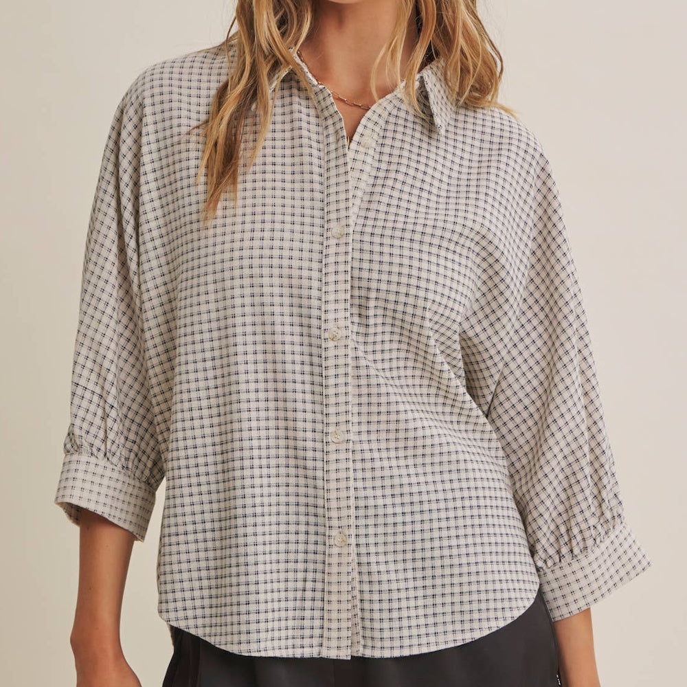 Off-white micro-grid plaid button-down shirt with wide dolman three-quarter sleeves and a relaxed fit.