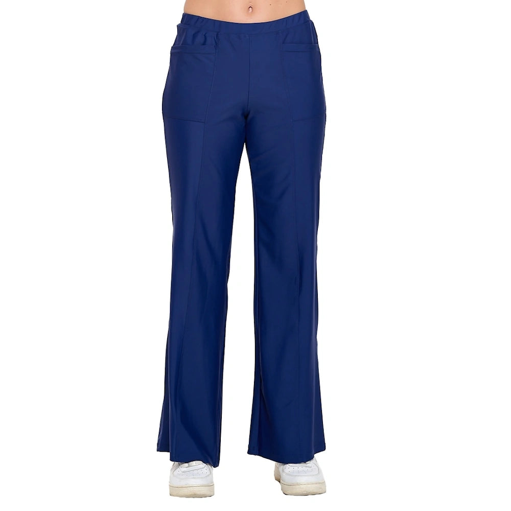 Navy blue wide-leg trousers for women featuring a high-waisted fit and side pockets, paired with white sneakers.