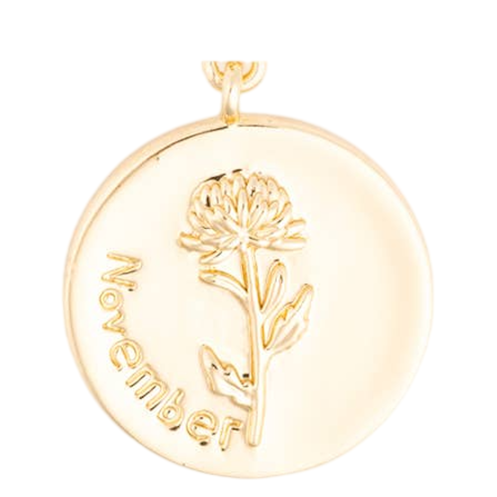 Round gold pendant charm featuring an engraved chrysanthemum flower and the word "November".