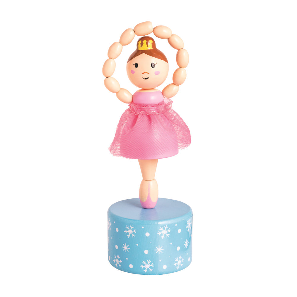 Wooden ballerina push toy in a pink tutu and gold crown, standing on a blue snowflake base. Simple, classic children's toy.