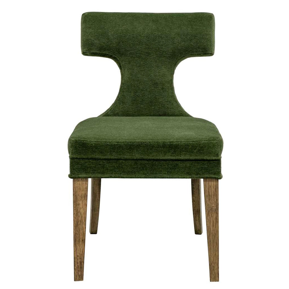 Modern green upholstered dining chair with a curved T-shaped backrest and tapered wooden legs on a white background.