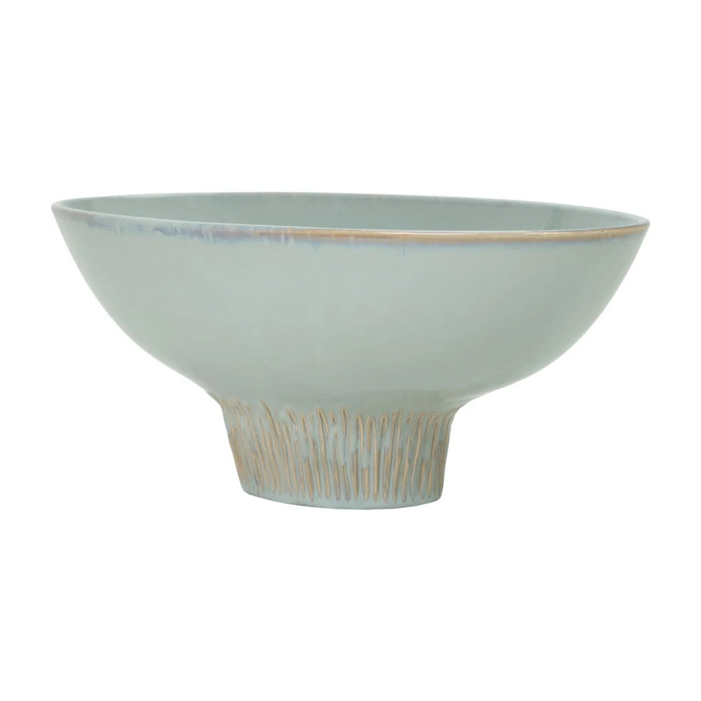 Pale light blue ceramic footed bowl with a wide rim and textured, ridged pedestal base.