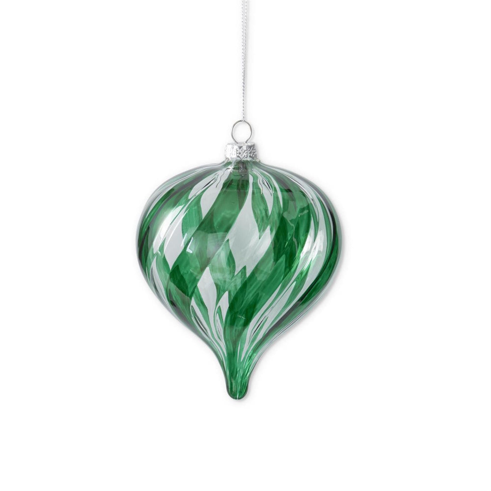 A hanging green and clear glass onion-shaped ornament featuring swirled patterns.