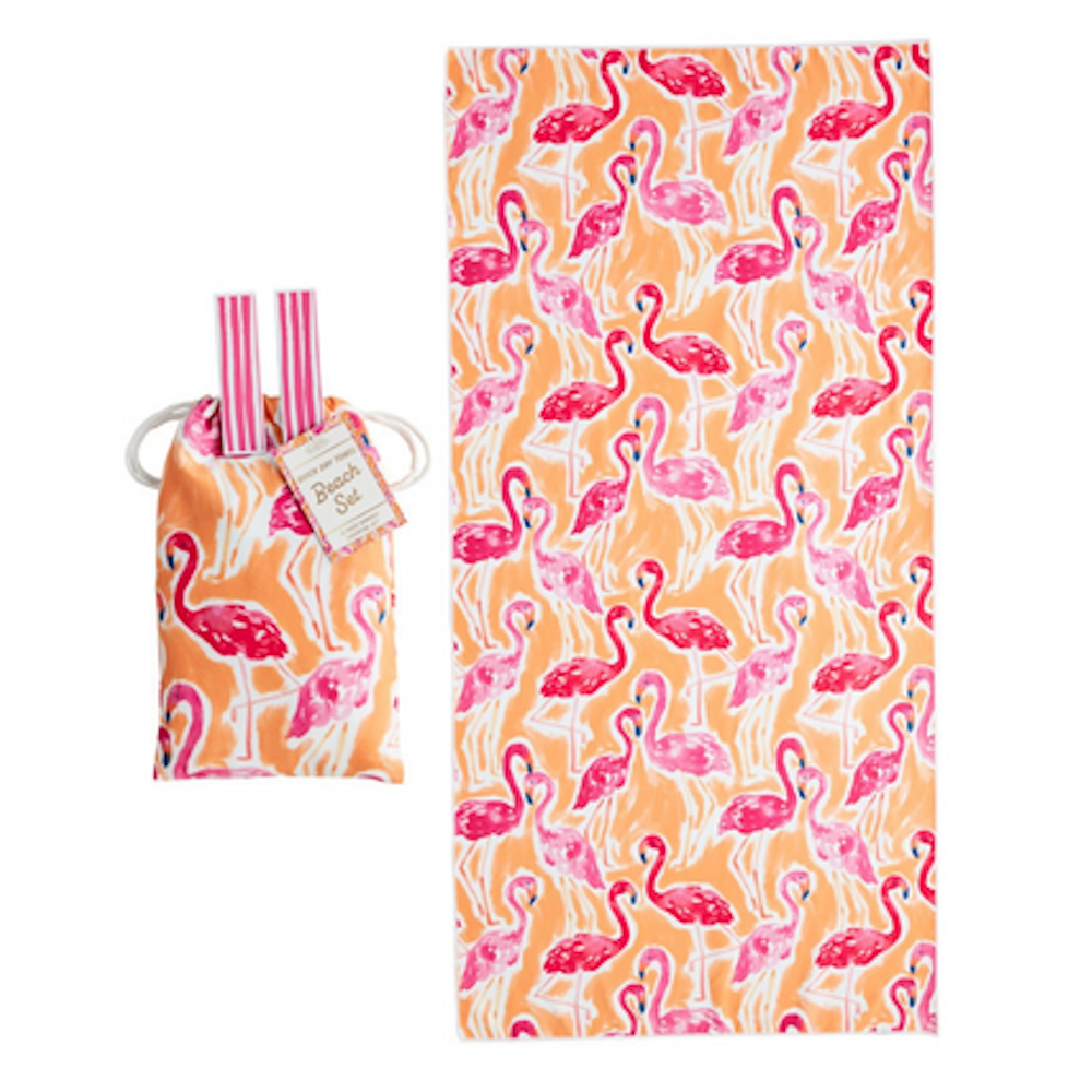 Orange beach towel and matching drawstring bag, both featuring a vibrant pink flamingo pattern.