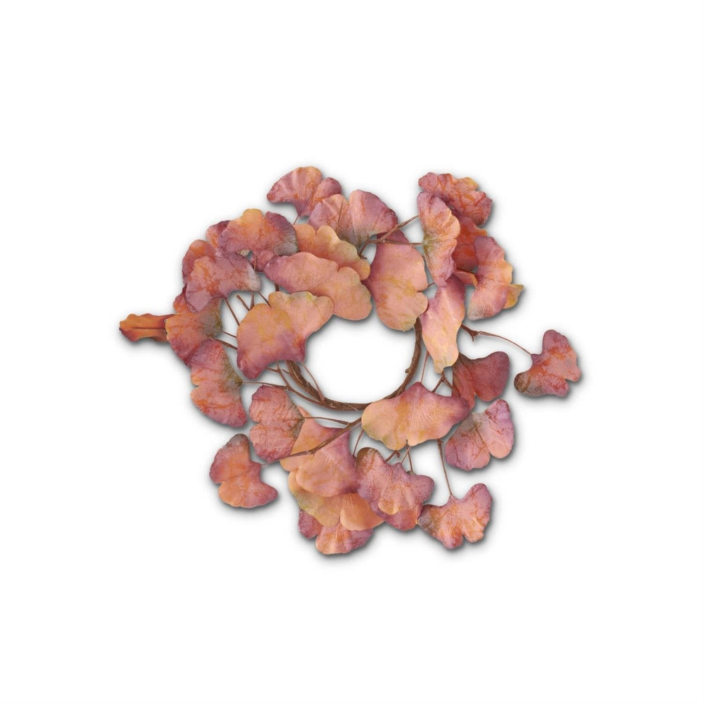 Autumnal candle ring crafted with artificial orange and pink ginkgo leaves.