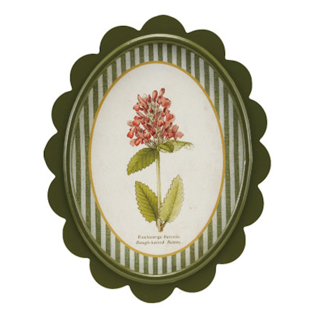Oval green scalloped wall decor featuring a botanical pink flower illustration on a green striped background.