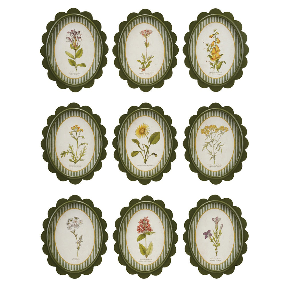 Set of nine green scalloped oval wall frames featuring various vintage botanical flower prints on striped mats.